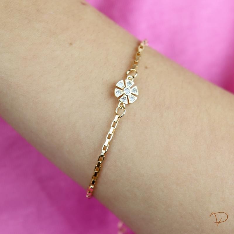 Pulseira infantil com uma flor banhado a ouro 18k