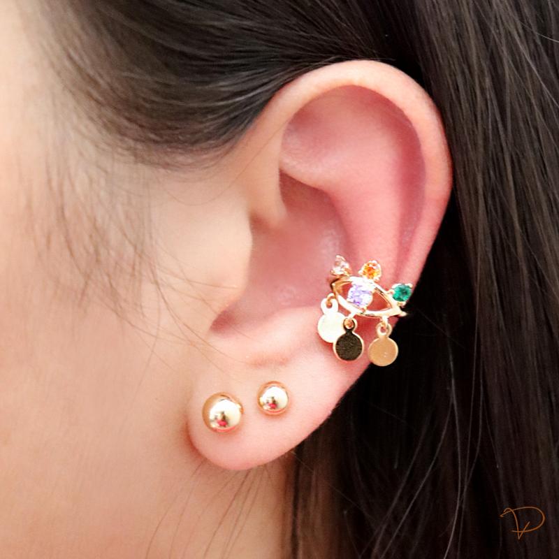 Piercing olho cravejado em zircônias coloridas banhado em ouro 18k