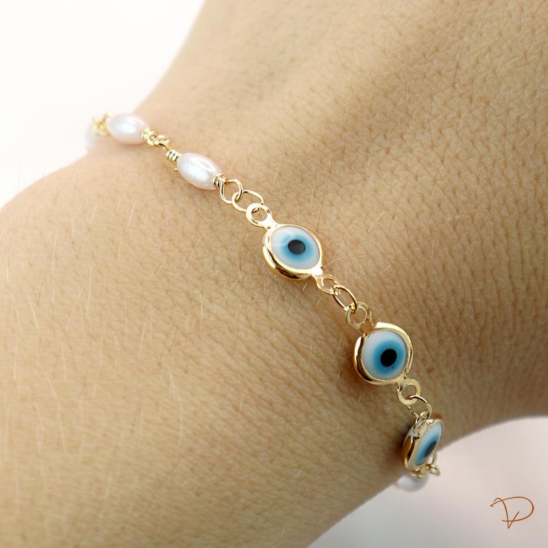 Pulseira de olho grego e pérolas banhado a ouro 18k