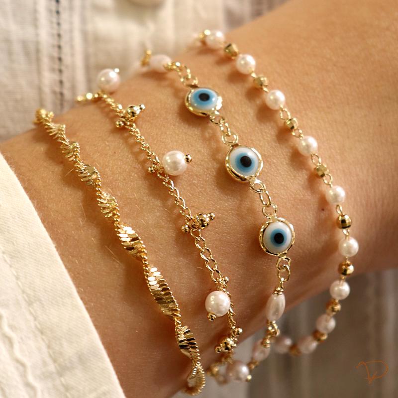 Pulseira de olho grego e pérolas banhado a ouro 18k