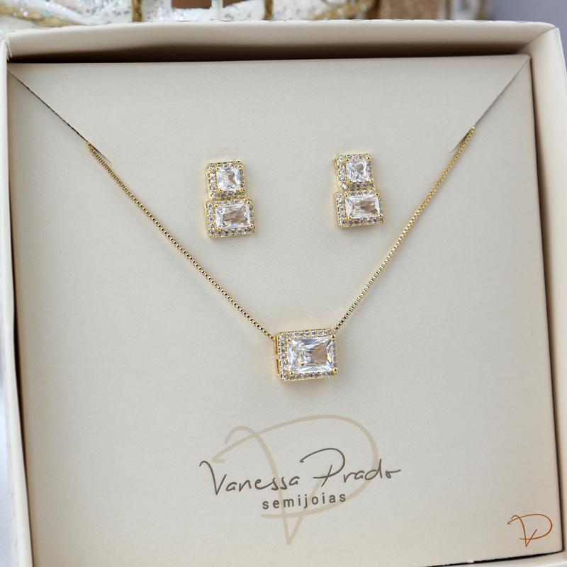 Conjunto retangular contornado cristal banhado a ouro 18k
